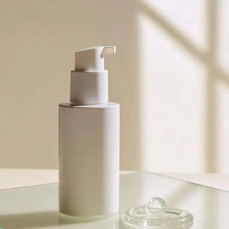 Pump bottle of topical finasteride gel with a swirl of gel dispensed