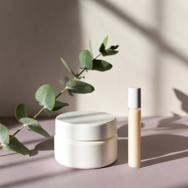Topical dutasteride jar and pill vial with a eucalyptus stem